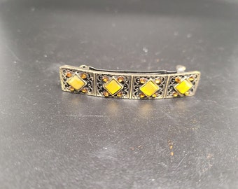 Antiqued Brass Barrette with Yellow and Orange Gems - Ornate background