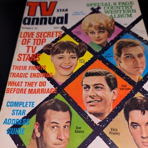 May include: Vintage "TV Star Annual" magazine, number 20, featuring celebrity portraits. The cover includes images of Sally Field, Dick Van Dyke, and Elvis Presley. The magazine's title is in large, bold letters with the text "Love Secrets of Top TV Stars."