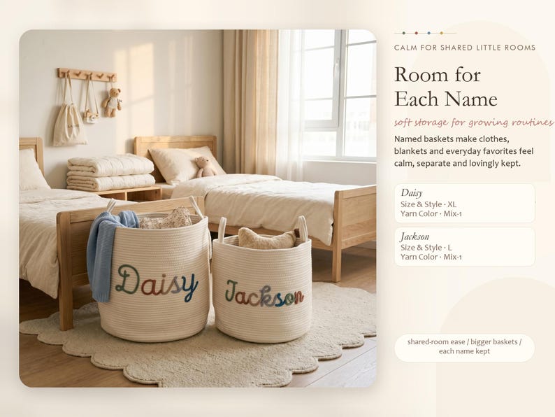 May include: Two off-white cylindrical woven rope storage baskets featuring embroidered names in a multi-colored gradient thread. The larger basket displays the name Daisy, and the smaller basket displays the name Jackson, both with two side handles.