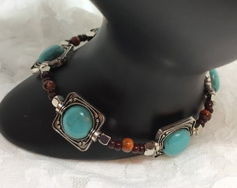 Turquoise and silver antique style bracelet