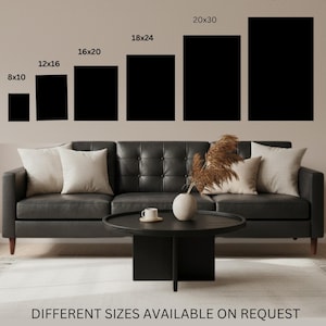 May include: Six black rectangular wall art frames arranged in ascending size order from 8x10 to 24x36 inches. Below, a dark leather sofa with light cushions, a round black coffee table with a white cup and vase, and text reading DIFFERENT SIZES AVAILABLE ON REQUEST.