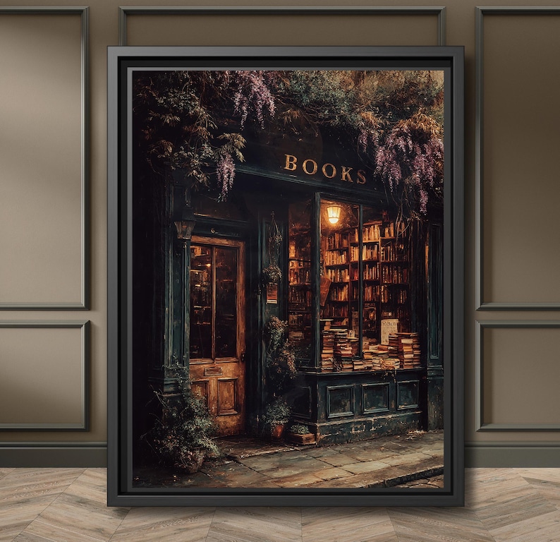 A black framed print of a Moody vintage bookstore exterior with warm golden light shining through windows filled with old books, ivy and wisteria framing the dark wooden door.