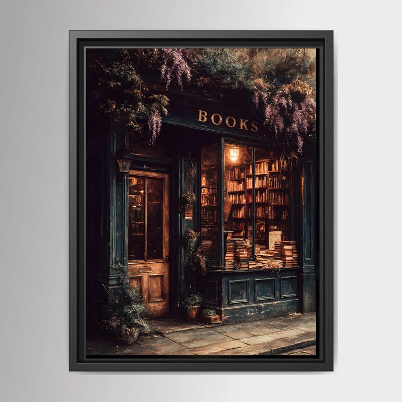 May include: A framed wall art print depicting a dark-toned bookstore storefront with the word BOOKS in gold lettering above the window. The shop features a wooden door, large glass windows filled with stacked books, and purple floral vines.
