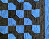 Amish Patchwork Bow Tie Quilt. 1930s. Blue and Black