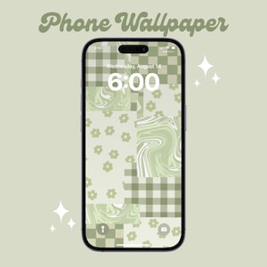 May include: A smartphone displays a green and white patterned phone wallpaper. The design includes checkered patterns, floral accents, and swirled marble-like textures. The time reads 6:00, with the date Wednesday, August 14 visible.