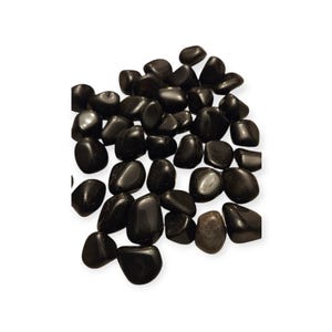 May include: A pile of polished, black obsidian stones. The stones are smooth, rounded, and of varying sizes and shapes. They have a glossy, reflective surface, and are set against a white background.