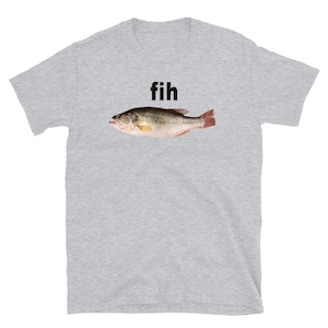 May include: A light grey t-shirt with the word "fih" above a fish. The fish is realistically depicted with a brown and green back, a white belly, and a red tail.