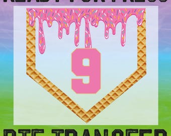 May include: A pink and white baseball-shaped design with a waffle pattern border and pink frosting dripping down the top. The number "9" is in the centre of the design. The text "READY FOR PRESS" is at the top and "DTF TRANSFER" is at the bottom.