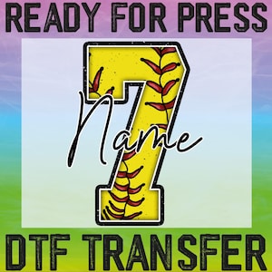 May include: Ready for press, a yellow and red softball with the number 7 and the word "Name" in black cursive. The background is a gradient of pink, blue, and green. The text "DTG Transfer" is at the bottom of the image.