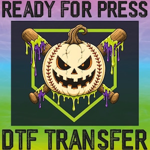 May include: A DTF transfer graphic featuring a baseball-shaped pumpkin with a jack-o'-lantern face, crossed by two wooden baseball bats covered in dripping green and purple slime, set against a lime green home plate shape with text.