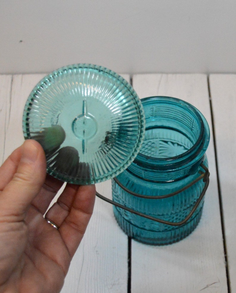 Vintage Avon Turquoise Embossed Glass Canister Jar image 2