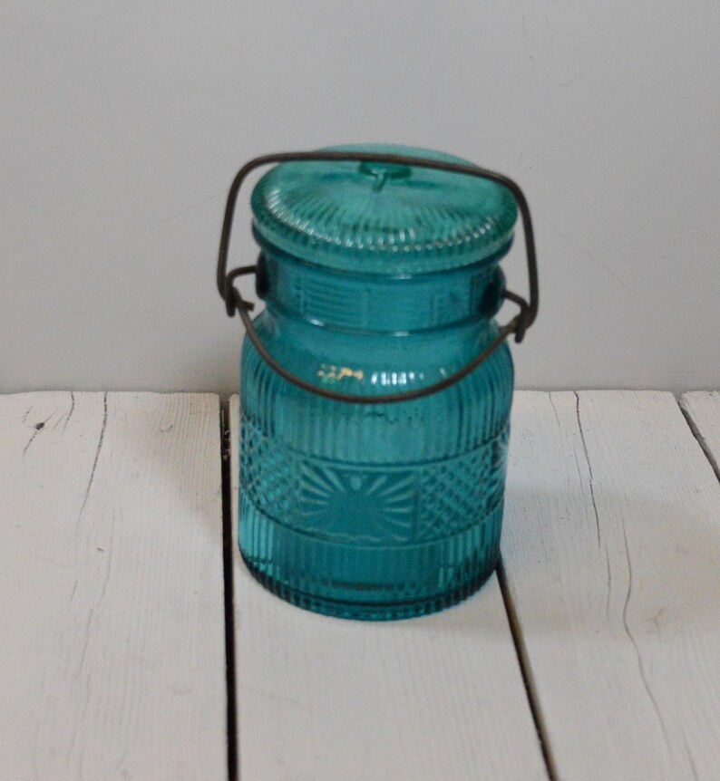 Vintage Avon Turquoise Embossed Glass Canister Jar image 1