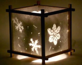 Linterna de armonía con copos de nieve en blanco y negro, linterna giratoria, lámpara de movimiento, luz relajante