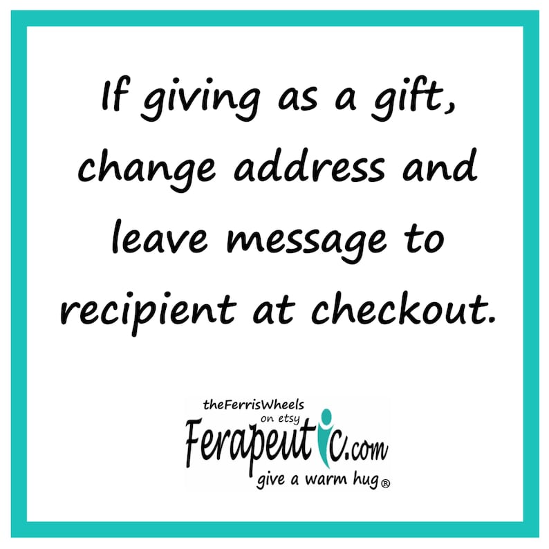 May include: A square sign with a teal border containing the black text: If giving as a gift, change address and leave message to recipient at checkout. Below this, the text reads: theFerrisWheels on etsy Ferapeutic.com give a warm hug.