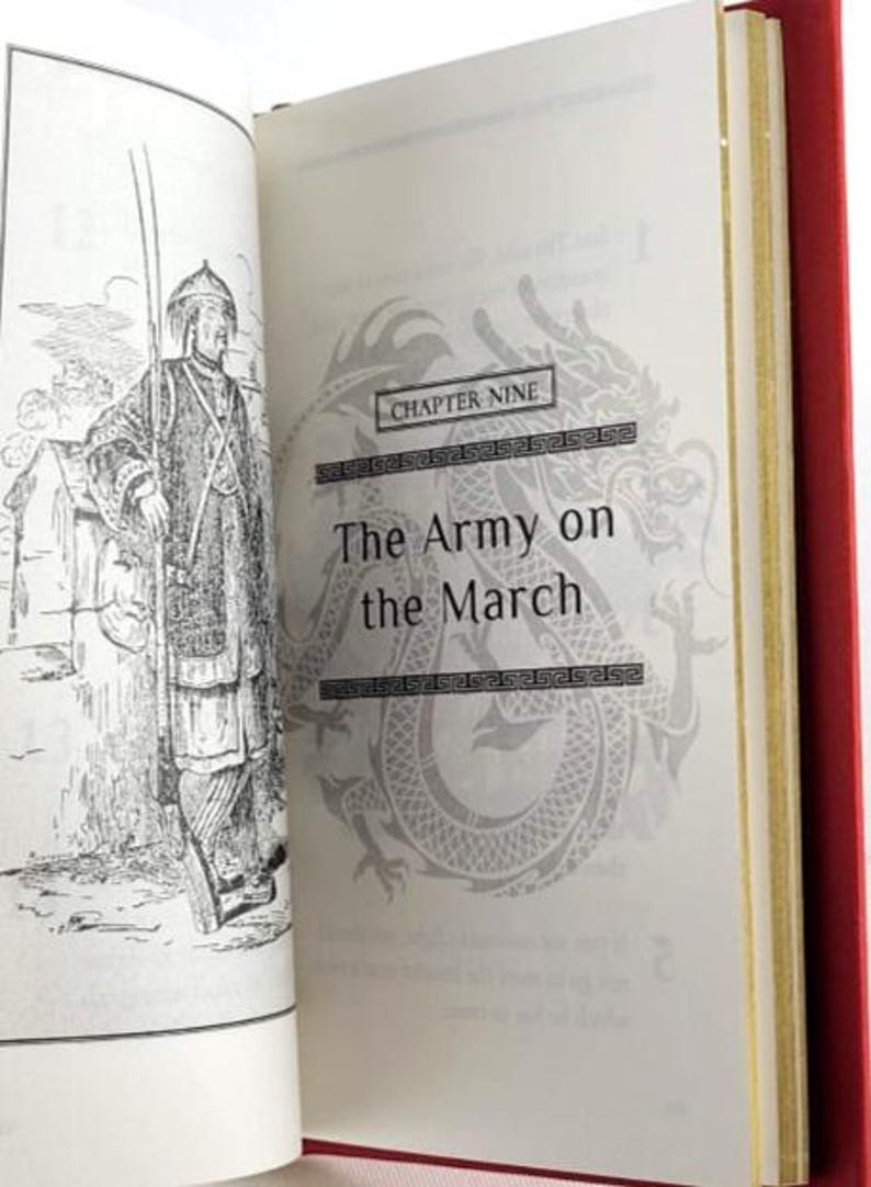 May include: A black and white illustration of a man in a traditional Chinese outfit standing next to a wall. The text "Chapter Nine The Army on the March" is printed on the page.