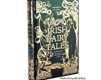 May include: A green hardcover book with gold lettering titled "Irish Fairy Tales". The cover features illustrations of fairies and other mythical creatures in a Celtic style.