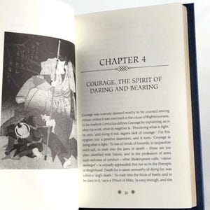 May include: Open book with a black and white illustration of a samurai warrior on the left page. The right page has the title "Chapter 4 Courage, The Spirit of Daring and Bearing" and text about courage in the cause of righteousness.
