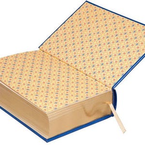 May include: A closed book with a blue cover and gold-gilded edges. The pages are decorated with a repeating pattern of red and blue flowers.