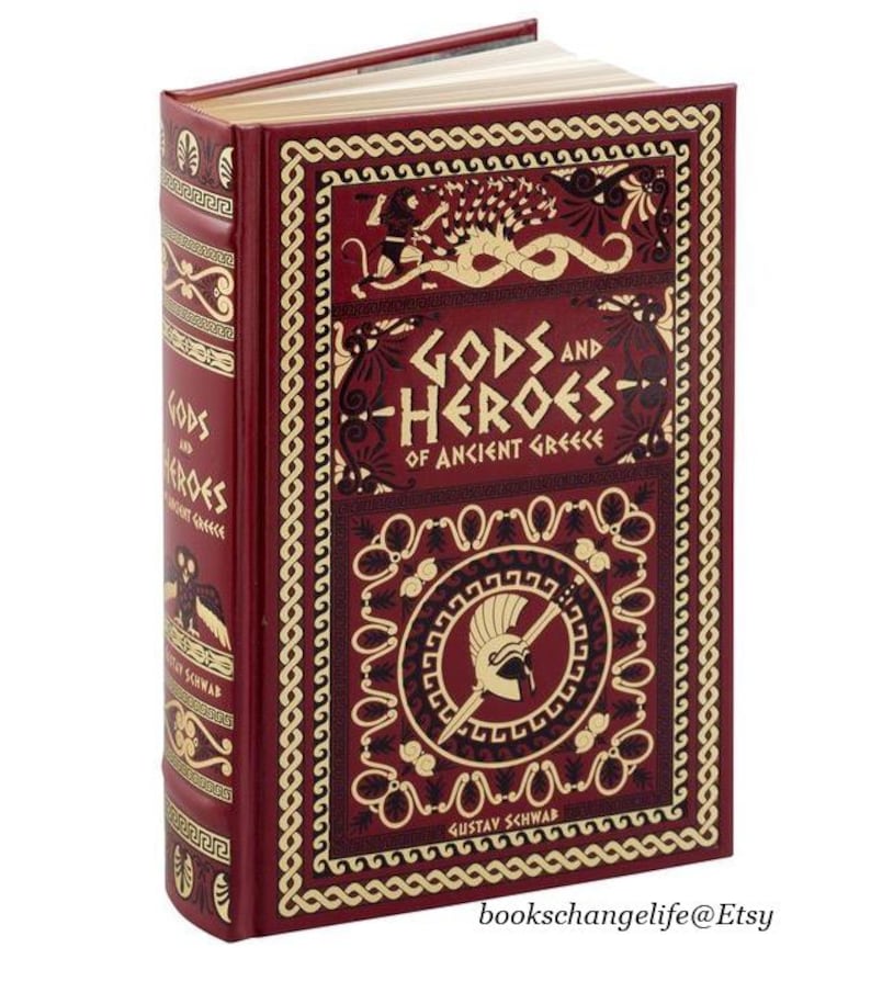 May include: A red hardcover book with gold accents and a title that reads "Gods and Heroes of Ancient Greece" by Gustav Schwab.