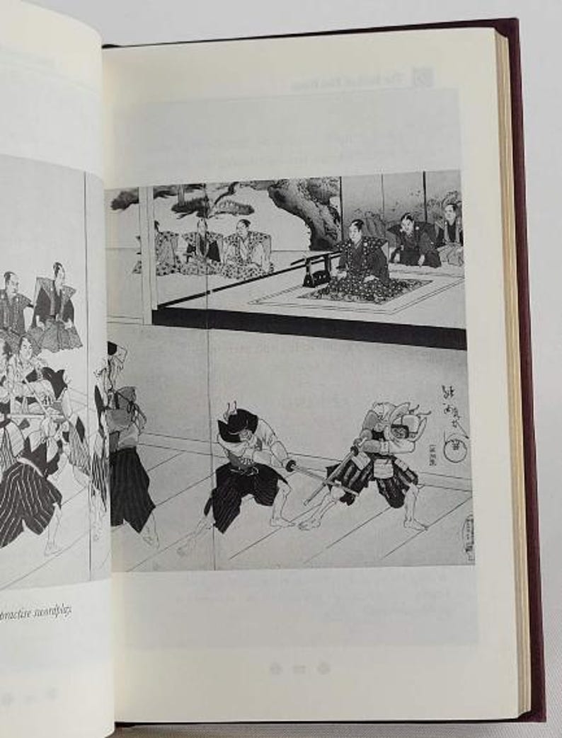 May include: A black and white illustration depicting a Japanese sword fight. Two figures are facing each other, one with a sword raised above their head. The other figure is blocking the attack with their sword. The illustration is set against a backdrop of a traditional Japanese house.