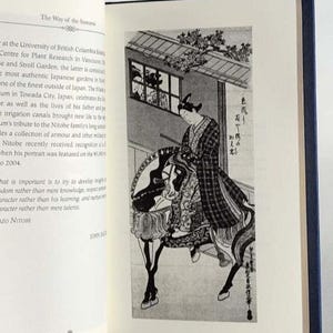 May include: A black and white illustration of a person riding a horse. The person is wearing a traditional Japanese outfit and a hat. The illustration is set against a background of a building with a window.