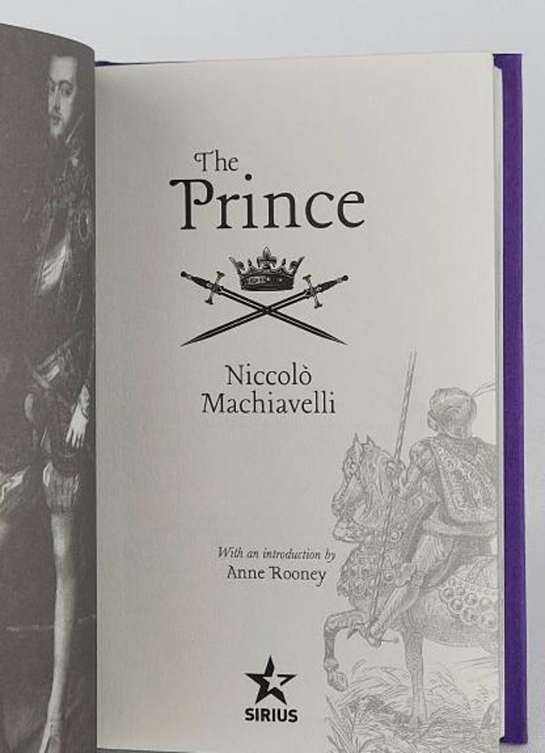 May include: A book titled "The Prince" by Niccol&ograve; Machiavelli with an introduction by Anne Rooney. The cover features a black and white illustration of a knight on horseback and a crown with two swords crossed underneath.