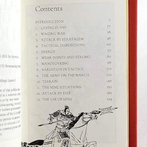 May include: A black and white illustration of a warrior on horseback, holding a spear. The illustration is from a book titled "The Art of War" by Sun Tzu. The book's table of contents is visible on the page, listing chapters such as "Laying Plans", "Waging War", and "Attack by Stratagem".