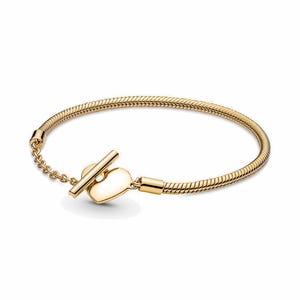 May include: A gold-colored bracelet with a snake chain design. The bracelet features a heart-shaped clasp with a bar closure. The jewelry is displayed on a white background.