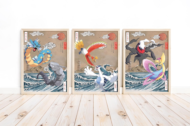 May include: Three framed prints featuring Japanese-style illustrations of Pokemon characters. The prints feature a blue and yellow water Pokemon, a red and white bird Pokemon, and a black and white ghost Pokemon.