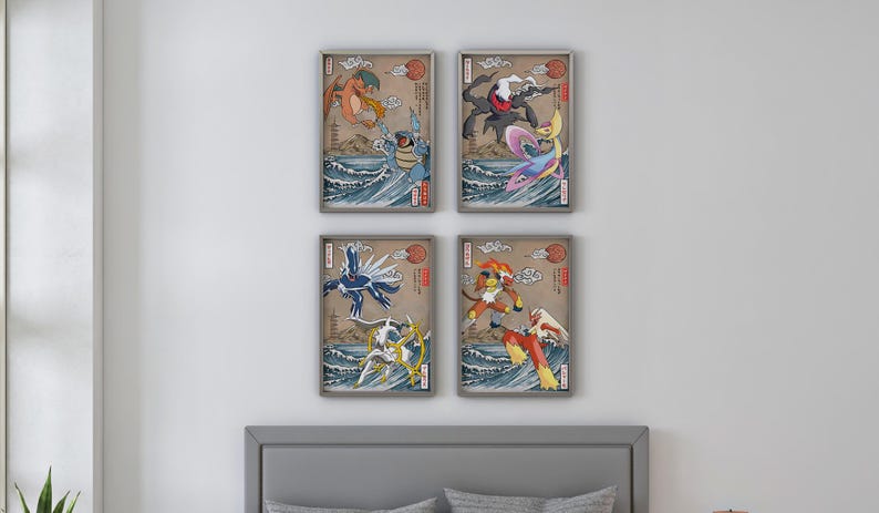 May include: Four framed prints featuring different Pokemon characters in a Japanese art style. Each print depicts a Pokemon character in a dynamic pose, surrounded by water and clouds. The prints are all in a similar style, with a light brown background and a black frame.