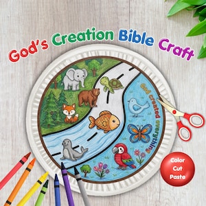 May include: A white paper plate craft featuring a colourful illustration of animals including an elephant, bear, fox, seal, turtle, fish, bird, butterfly, and parrot. The text reads God's Creation Bible Craft and God Created everything.