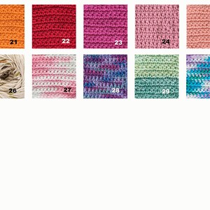 May include: A collection of 10 yarn samples in various colors and textures, including orange, red, pink, green, blue, and white. The yarn is arranged in a grid pattern with numbers 21 through 30 labeling each sample.