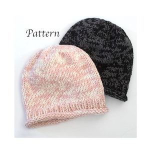 May include: Two knitted beanies. One is pink and white, the other is black and grey. The word "Pattern" is written in black cursive on the top left of the image. The beanies are made of a soft, textured yarn.