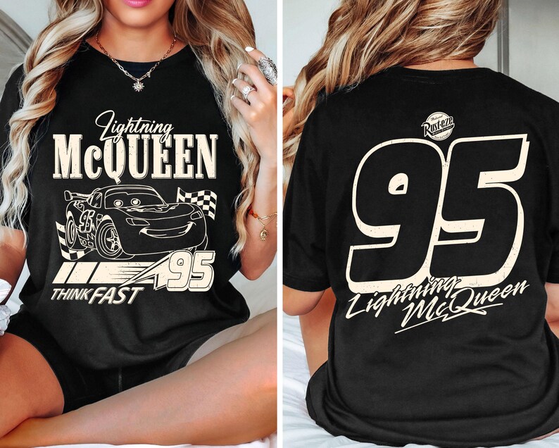 May include: Black t-shirt featuring a graphic of Lightning McQueen with the text "Lightning McQueen" and "95". The front design includes a car illustration and the words "Think Fast". The back displays a large "95" and "Lightning McQueen".