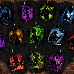 May include: A collection of black t-shirts featuring colorful silhouette designs of various characters. Each shirt showcases a different character in vibrant hues, including blue, purple, green, orange, and yellow, against a dark background. The shirts are arranged on a wooden surface.