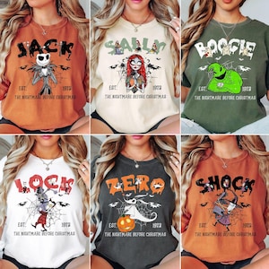 May include: Six t-shirts featuring characters from "The Nightmare Before Christmas." Each shirt has a different character graphic and the text "EST. 1973." Colors include orange, cream, green, white, charcoal, and rust.
