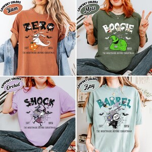 May include: Four t-shirts in various colors, each featuring a graphic from "The Nightmare Before Christmas." The shirts display "Zero," "Boogie," "Shock," and "Barrel" designs, with the text "EST. 1973" below each. The shirts are in the colors Yam, Moss, Orchid, and Bay.