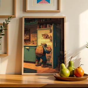 May include: A framed art print depicts a cartoon turtle character, holding a pizza, in front of an open refrigerator. A cat sits inside the fridge. The artwork is in a kitchen setting with a warm color palette.