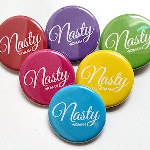 Nasty Woman Pins – 1.25 inch Pinback Buttons