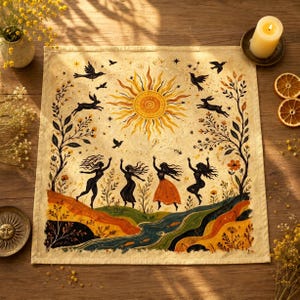 May include: A square, cream-colored tapestry with a sun, birds, and dancing figures design. The artwork features a large sun in the center, with birds and rabbits flying around it. Four figures are dancing on a hill, with a river flowing below.