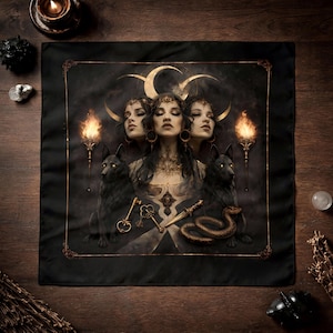 May include: Black square tapestry featuring a mystical design. The artwork depicts a woman with three faces, flanked by black wolves and torches. Gold keys, a dagger, and a snake are also present. The tapestry has a gold border and is set against a dark background.