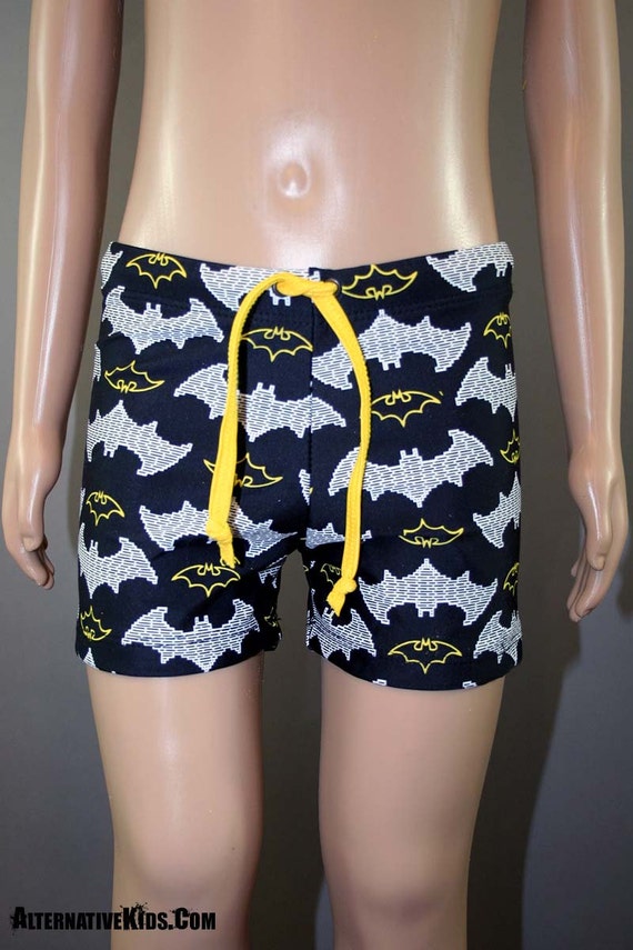 black and yellow swim trunks