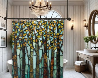 May include: A shower curtain featuring a stained glass style pattern of a forest with tall dark tree trunks and vibrant yellow and orange leaves against a light blue background, suspended from a black metal rod with circular rings.