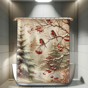 May include: A shower curtain featuring a winter scene with two robins perched on snow-covered branches laden with red berries. The design includes evergreen trees dusted with snow, set against a soft, muted background, hanging from a metal rod.