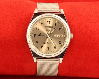 Vintage Refurbished Seiko 5 automatic japan day date silver arabic dial working wrist watch