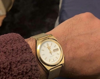 Montre-bracelet vintage japonaise Seiko 5 avec date et date automatique, cadran blanc doré, remise à neuf