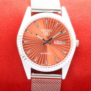 Vintage Refurbished Seiko 5 automatic japan day date orange dial mens working wrist watch 35mm.