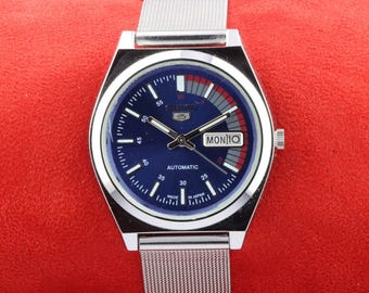 Vintage Refurbished Seiko 5 automatic japan day date blue racer men's dial wrist watch