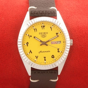 Vintage Refurbished Seiko 5 automatic japan day date yellow Arabic dial working wrist watch