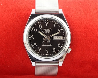 Arabic 1980s Seiko 5 automatic japan day date black dial wrist watch